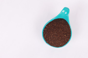 top view tea powder in containers isolated on white background