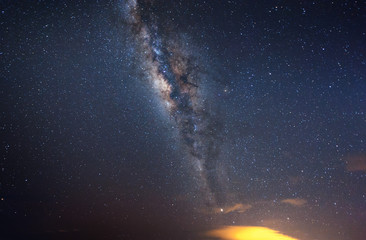 Milky way Galaxy and stars with space dust. soft focus noise due to long expose and high iso.