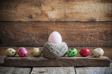 Easter eggs on old wooden background