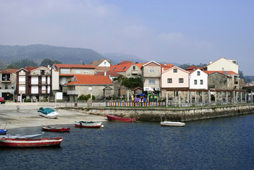View of houses and boats in the sea at Combarro, Galicia, Spain