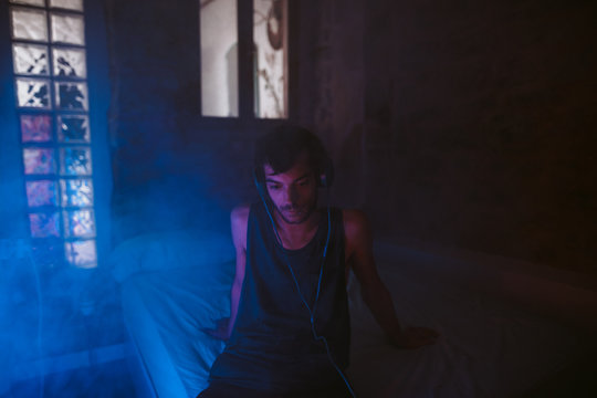 young man listening to music