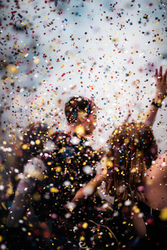 People celebrating with confetti