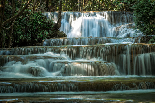 Close up of Huay Maekamin Waterfall Tier 1 (Dong Wan or Herb Jungle) in Kanchanaburi, Thailand; photo by long exposure with slow speed shutter © Meng_Dakara