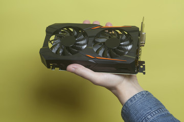 Graphic video card holding hand