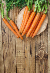Fresh raw carrots with leaves