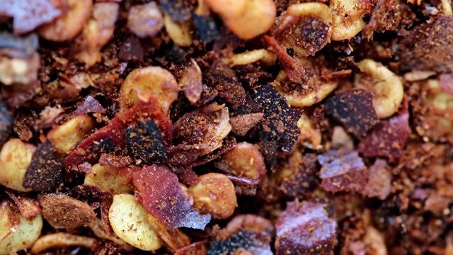 Seeds of dried peppers close up. Hot spicy chilli, macro view. Rotation pile of dry paprika.