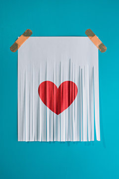 Isolated of shredded heart on a blue background