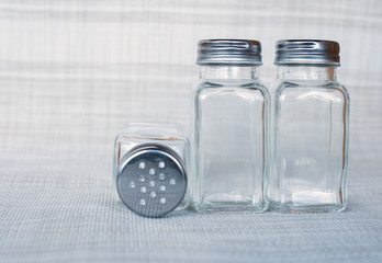 three empty spices glass bottle.