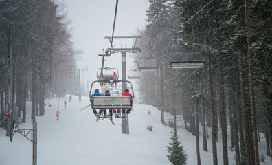 Snow storm of the hill in the ski resort.