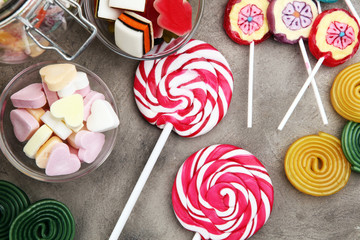 candies with jelly and sugar. colorful array of different childs sweets and treats.