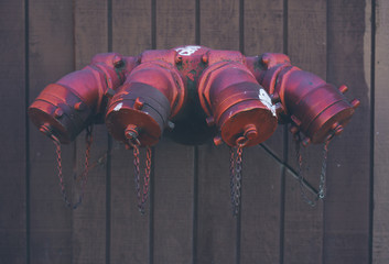 Detail of fire hydrant access piping on side of building