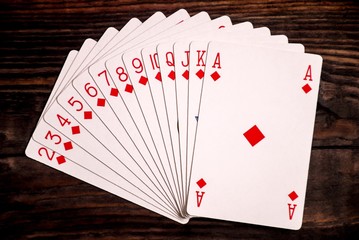 Playing cards on wood