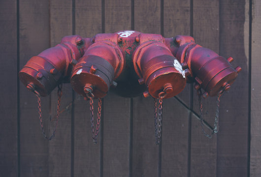 Detail of fire hydrant access piping on side of building