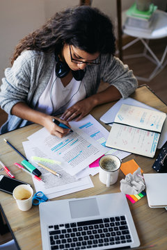 Woman studying at home.