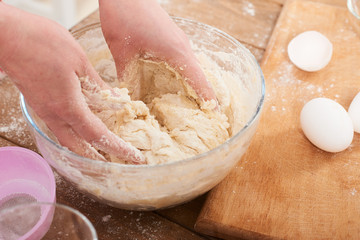 Woman doing dough at home. Healthy food concept