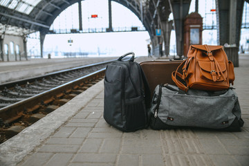 Fototapeta premium bags at railway station near railroad