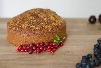 Homemade cake with red berries.