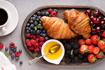 Croissants with fresh berry and honey