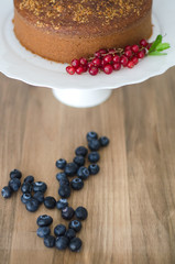 Obraz na płótnie Canvas Homemade cake with red berries.