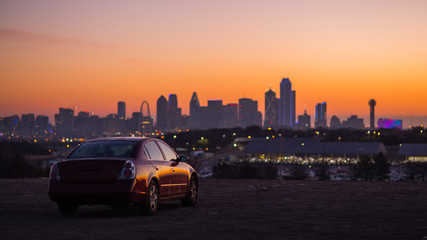 The Car with City Skyline Sun Rise, Dallas, TX