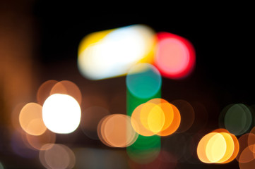 Close up Blurred Defocused bright multicolored yellow green red city lights in bokeh effect