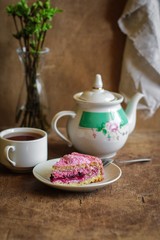 Obraz na płótnie Canvas biscuit cake with pink berries cream - festive serving