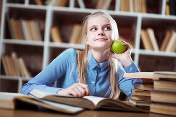 Teenage girl in a library