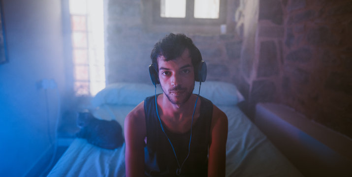 young man listening to music