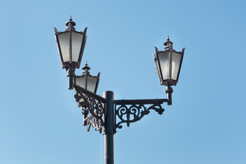 Fototapeta na wymiar Antique street lamp in art nouveau style. Beautiful detail. Close up.
