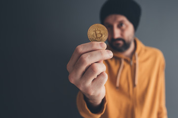 Fototapeta na wymiar Man offering bitcoin