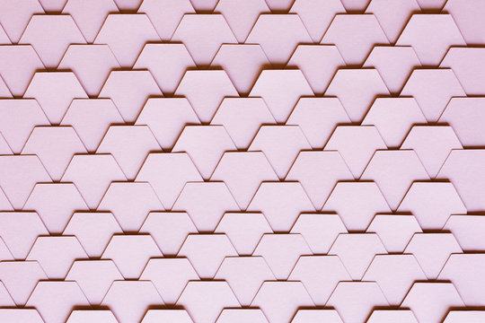 Pastel pink hexagon tiled background