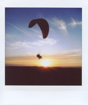 Paragliding at sunset.