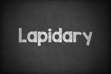 Obraz premium Lapidary on Textured Blackboard.