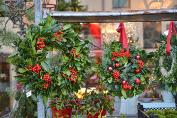 Fototapeta na wymiar Natural Christmas wreaths of holly