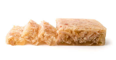 Meat jelly cut in slices on a white