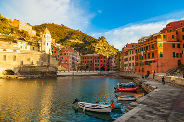 VERNAZZA, ITALY - DECEMBER 22, 2017:  Vernazza village center with church and houses at down, Cinque Terre national park, Liguria, Italy.