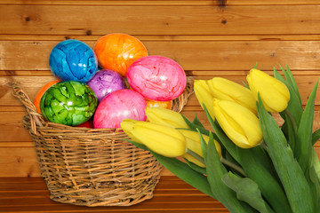 easter eggs and yellow tulips