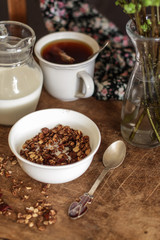 Breakfast granola with milk, cookies. Tasty and healthy food