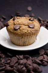 Homemade Chocolate Chip Muffins on a Slate Tabletop