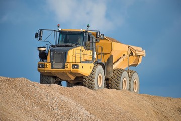 Construction Site - Engineering - Sea Defence. Large plant machinery being use to build the beach sea defence at Seaford, East Sussex, UK