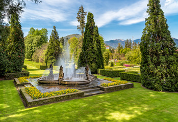 Fototapeta na wymiar Fountain in the Botanical Garden of Villa Taranto, Pallanza, Verbania, Italy. 