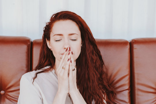 Woman with eyes closed in meditation