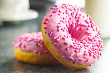 Two pink donuts.