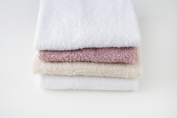 Fototapeta na wymiar on a white table color towels