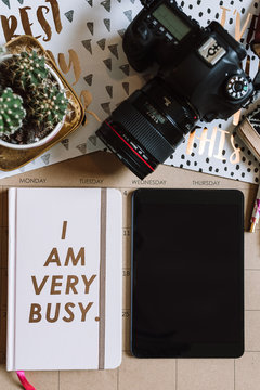 Daily planner with smart tablet and coffee