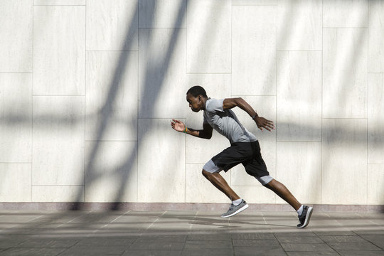 Man in motion of running
