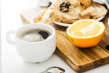 Morning coffee with croissant on the table