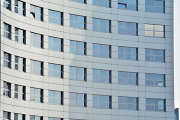 Glass walls of a office building - business background
