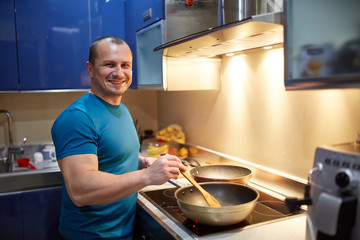 Man cooking at home
