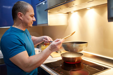 Man cooking at home